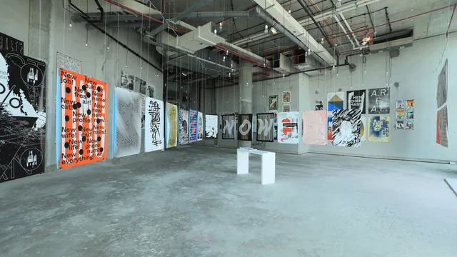 Historical Dubai Design Week exhibition with graphic design posters