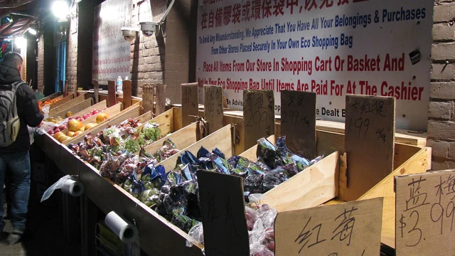 Fresh vegetables displayed outside a neighbourhood grocery shop.