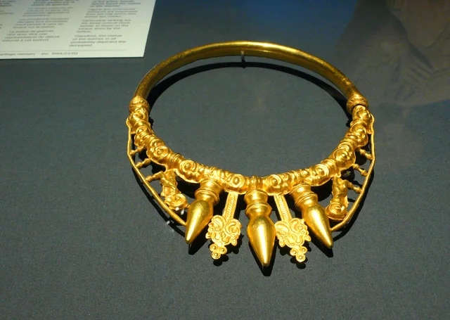 Representative ancient Celtic gold torque with elaborate suspended decoration