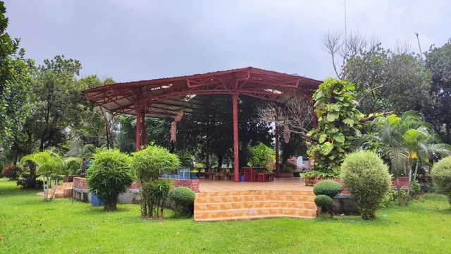 Representative garden pavilion surrounded by planting; not the Three Gardens and a Room installation.