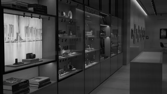 Representative exhibition setting: illuminated display cases in a photography museum; not the listed venue.